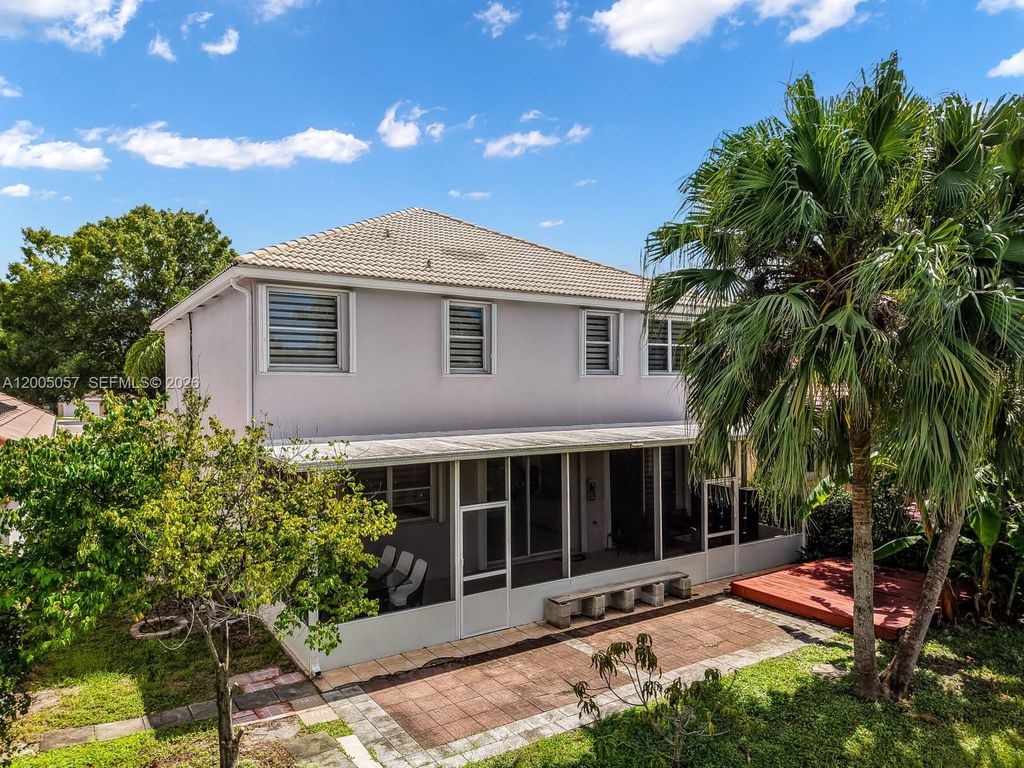 Photo of 1817 NW 49th Ave, Coconut Creek, FL 33063 (MLS # A12005057)