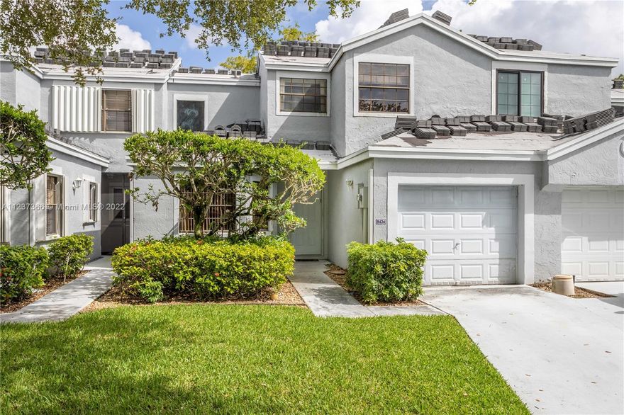 Welcome home to this spacious, fee-simple townhouse in the quiet and well-maintained community of Waterford Isles! Gorgeous golf course and lake views!  Master bedroom is on the first floor with a large walk in closet and master bath. Vaulted ceilings throughout, screened in porch with accordion shutters, a 1-car garage with plenty of parking on the driveway. Second floor has a flex space in addition to the 2nd bedroom and a full bathroom.  Association in process of replacing all the roofs in the community.  This home is a must-see!