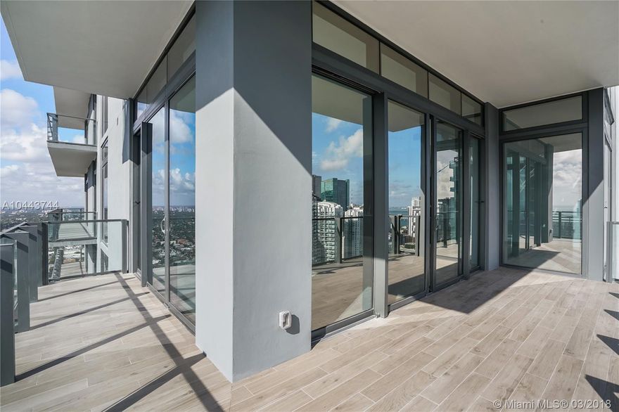 Rise to the occasion and be a global adventurer, by being part of this unprecedented big wave of excitement of high- end living in burgeoning downtown Brickell Miami. Live in an exclusive collection of residences high above it all on the CORNER of the 40th floor overlooking panoramic wide water and city views. Feature's include 11'4 ceiling heights , modern Italian kitchen and boasting 4000 square feet of living space. In a separate private space allocated to this residence is a guest/help area.