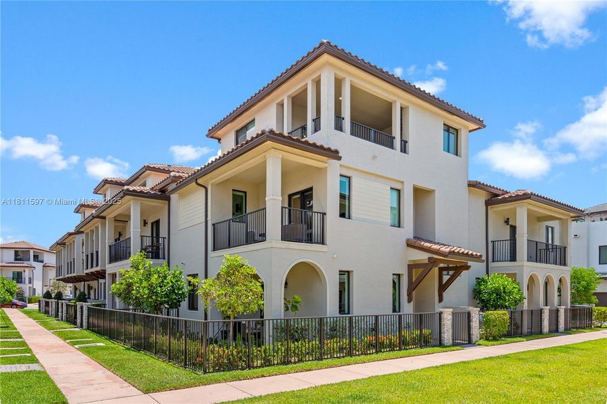 Modern 3-story corner unit townhome in Urbana at Downtown Doral with a stunning sky-view terrace! custom built kitchen top of the line finishes. Features 3 bedrooms, 2 full baths, 2 half baths, built-in closets, and a 1-car garage. Resort-style amenities include a clubhouse, fitness center, and pool. Walk to restaurants, parks, and A-rated schools—live like you're on vacation every day!