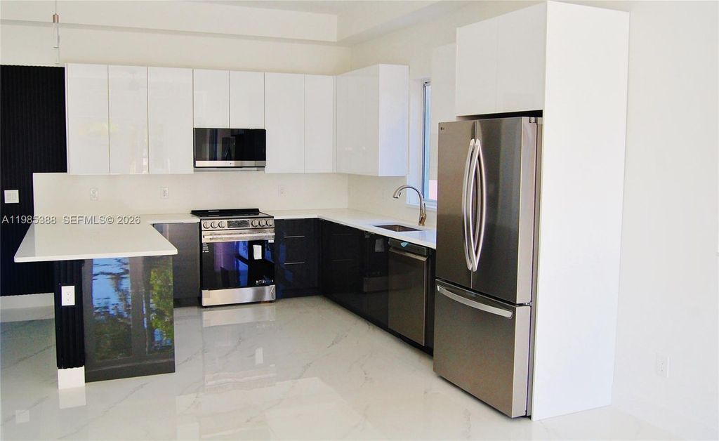 Photo of 2640 NW 3rd St, Pompano Beach, FL 33069 (MLS # A11985388)