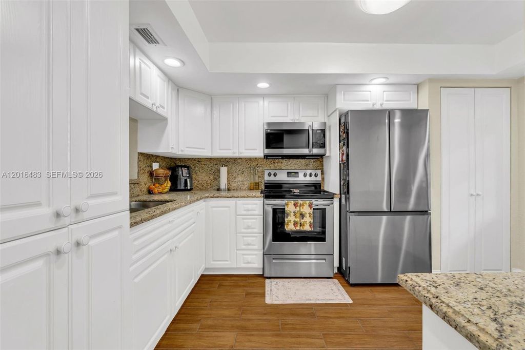 Photo of 1101 Colony Point Cir #309, Pembroke Pines, FL 33026 (MLS # A12016483)