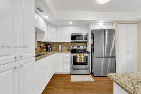 Photo of 1101 Colony Point Cir #309, Pembroke Pines, FL 33026 (MLS # A12016483)