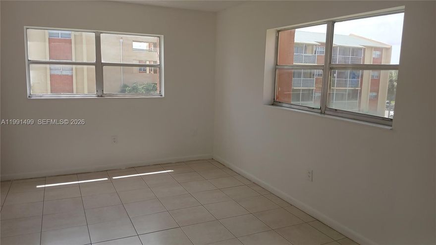 An excellent investment opportunity: a unit featuring two bedrooms and two bathrooms, with an HOA fee of approximately $500, currently tenant-occupied. The location is superb—situated very close to N. State Road 7, and positioned between I-95 to the east and the Florida Turnpike to the west. Both highways are just minutes away, providing quick access to two of Florida's most important thoroughfares.