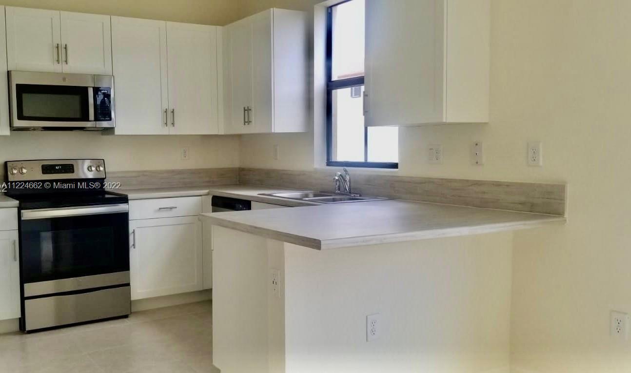 AQUABELLA SECTION TWO - Residential Lease