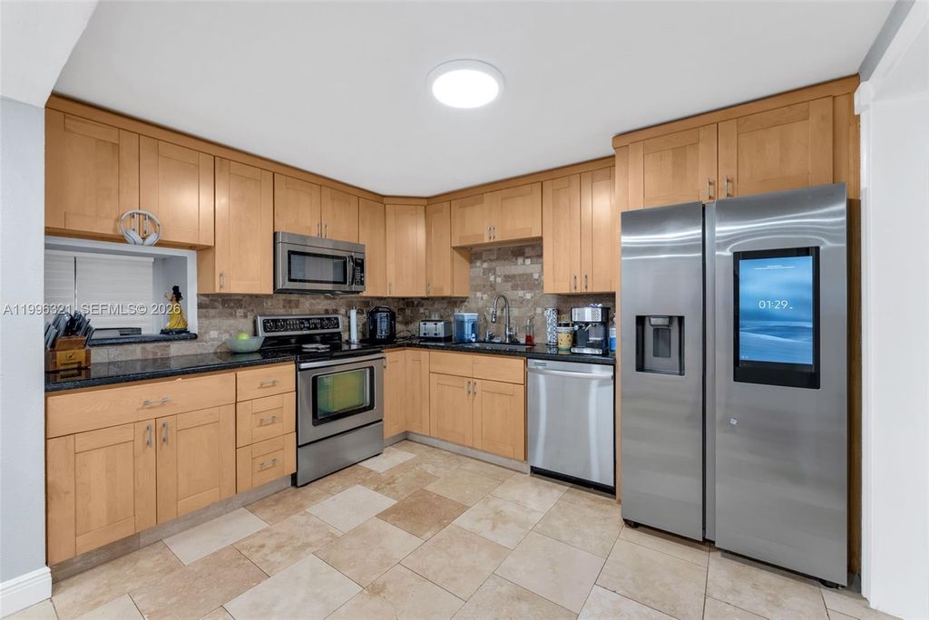 Photo of 7653 NW 79th Ave #109, Tamarac, FL 33321 (MLS # A11996321)