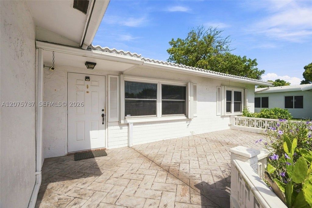 Photo of 1431 NW 85th Way, Plantation, FL 33322 (MLS # A12075787)