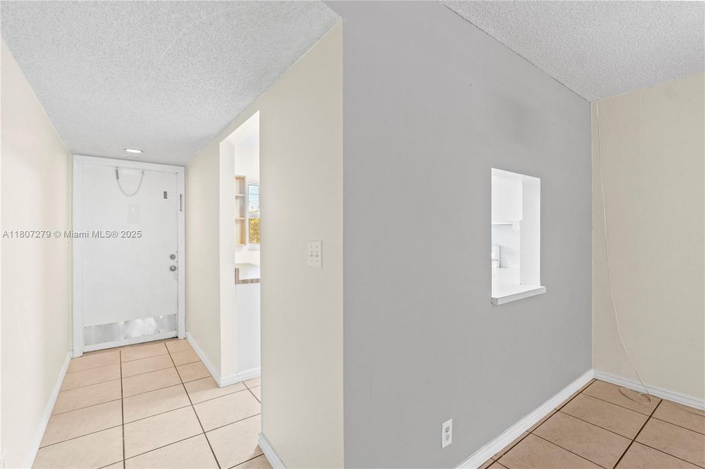 Photo of 8605 W Sample Rd #306, Coral Springs, FL 33065 (MLS # A11807279)