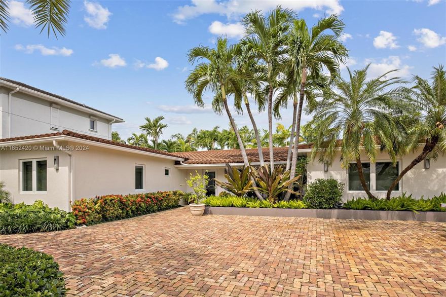 Welcome to this exceptional residence located in the prestigious Key Biscayne community. This magnificent home boasts 5 spacious bedrooms and 4.5 luxurious, all in-suite bathrooms, for utmost comfort and privacy. Step inside and be captivated by the elegance and charm of this meticulously designed property. Open floor plan seamlessly connects the living spaces, creating a sense of flow and abundance throughout. With a focus on quality and attention to detail, the house showcases top-of-the-line finishes and craftsmanship. The heart of the home lies in its beautiful kitchen, featuring modern appliances and ample storage space. The stunning white quartz countertops add a touch of sophistication, making this space perfect for both everyday living and entertaining guests.