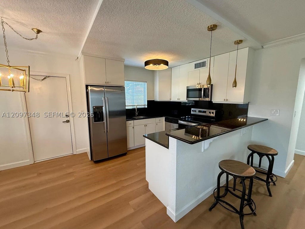 Photo of 1353 Holly Heights Dr #3, Fort Lauderdale, FL 33304 (MLS # A12097348)