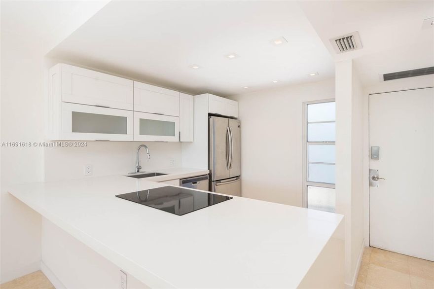 Reduced for Fast Sale !!! MUST SEE BEST ONE BEDROOM ON THE MARKET  and clean as a whistle.  RENOVATED. 1-bedroom, 1 full bath in bedroom plus guest bathroom. Beautiful marble floors and a modern open kitchen with stainless steel appliances and ample cabinetry. Oversized Primary bedroom is huge with WALK IN CLOSET. Enjoy a screened balcony w views Turnberry Golf Course, with quick access to the 3 mile exercise the Turnberry circle.  Enjoy 
pool, fitness center, security, maintenance covering cable, internet, and pest control. 
Owner willing to pay or help with special assessment based on offer presented.  Monthly maintenance will only be $735 a month  vs  12 years just started 2025 -  $174.15 monthly for a total of $899. Huge Value with special assessment paid in full.