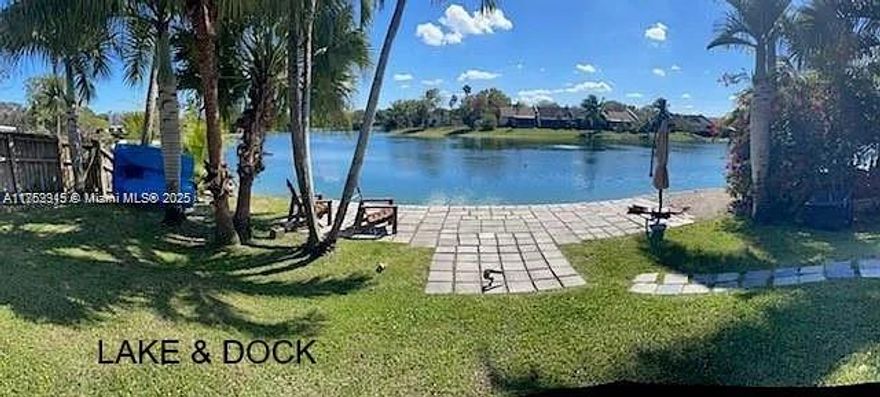 Beautiful 4-Bedroom Lakefront Home with 2-Car Garage in The Villages of Homestead  ***ASSUMABLE MORTGAGE AT 2.25%! Veterans and Non-Veterans can assume*** Discover this stunning 4-bedroom, 3-bathroom home featuring a 2-car garage, nestled on a serene lake with breathtaking views from your screened-in patio. Enjoy the comfort of a spacious island kitchen, perfect for family gatherings and entertaining. This home boasts a new roof installed about 2 years ago, and offers the convenience of one bedroom and a full bath on the first floor, ideal for guests or multi-generational living. Located close to major grocery stores, outlet mall, schools, and easy access to the Florida Turnpike for effortless commuting. This beautiful home won't last long! Seller closing costs contribution considered.
