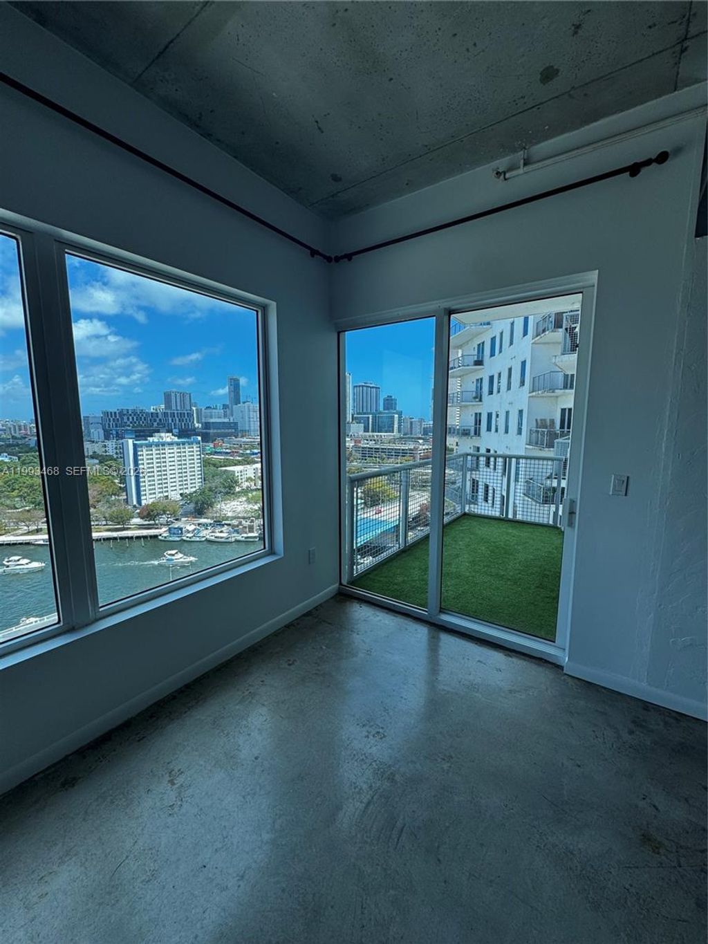 Photo of 10 SW South River Dr #1710, Miami, FL 33130 (MLS # A11993468)