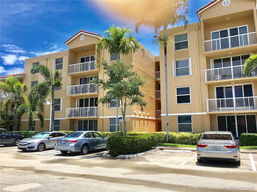 GUARD GATED ENTRY LOCATED APPX JUST 1 MILE WEST FROM THE ATLANTIC OCEAN AND RIGHT ACROSS THE STREET FROM THE ACCLAIMED WEST LAKE COMMUNITY PARK.  THIS CLEAN, READY TO MOVE INTO UNIT FEATURES SPLIT (COULD BE TWO MASTER BEDROOMS) & TWO FULL BATHROOMS. MASTER SUITE FEATURES A LARGE CLOSET AND BATH W E-Z WALK-IN SHOWER (NO TUB)., & GUEST BATHROOM DOES HAVE A REGULAR TUB. OPEN KITCHEN WITH PLENTY OF STORAGE AND COUNTER SPACE. FULL SIZE WASHER AND DRYER IN A SEPARATE UTILITY CLOSET. LOVELY LARGE SCREENED PRIVATE PATIO. COMMUNITY HAS BEAUTIFUL HEATED POOL AND CLUBHOUSE LOCATED ACROSS FROM THIS BUILDING PLUS TENNIS COURT. CAN BE RENTED RIGHT AWAY, ONCE A YEAR.