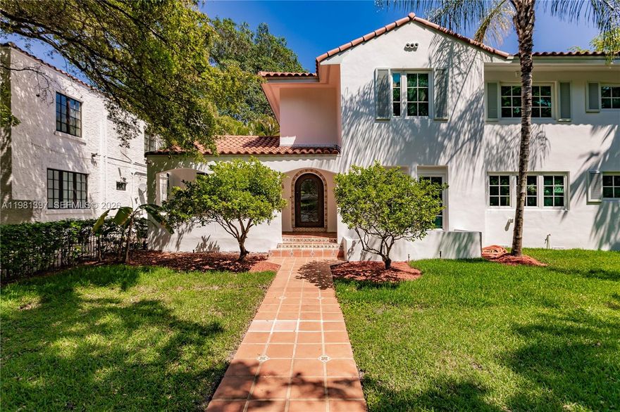 Quintessential Spanish Colonial inspired Coral Gables Estate home on an expansive 15,000 SF corner lot. Located on prestigious and picturesque tree lined Alhambra Circle. This landmark residence features a 2 story 5-bedroom, 3-bath main home with a large bedroom and bathroom conveniently situated on the first level.  Four ample sized upstairs bedrooms and 1/1 guest house.  Recent improvements include a new roof, new AC and ductwork, exterior paint, and septic system.  Key features include impact windows, a spacious 2-car newly insulated garage, and pool.  With its classic architecture and prime location, this home embodies the timeless sophistication of living in one of the city's most sought after neighborhood.