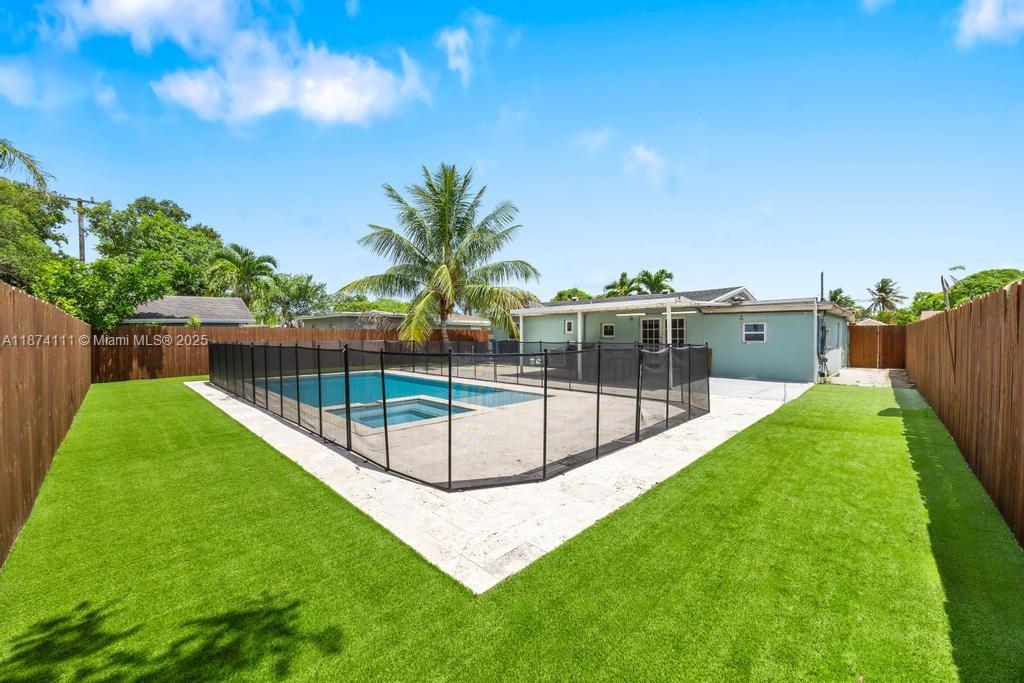Enjoy this charming 4-bedroom, 2-bathroom home offering 1,200 sq. ft. of comfortable living space. Recently updated with a brand-new kitchen overlooking into the pool and expansive patio, the backyard is fully fenced for privacy and features lush, low-maintenance turf for year-round greenery. The outdoor space is ideal for both entertaining and quiet relaxation under the palm trees. Inside, you’ll find beautifully renovated kitchens, bathrooms, and flooring with a modern touch. Conveniently located near the Florida Turnpike, 441, and I-95, with easy access to premier destinations such as the Hard Rock Guitar Hotel & Casino, the new Dolce Hotel, Dania Pointe Shopping Center, and top local restaurants. Houses of worship are just a short walk away.