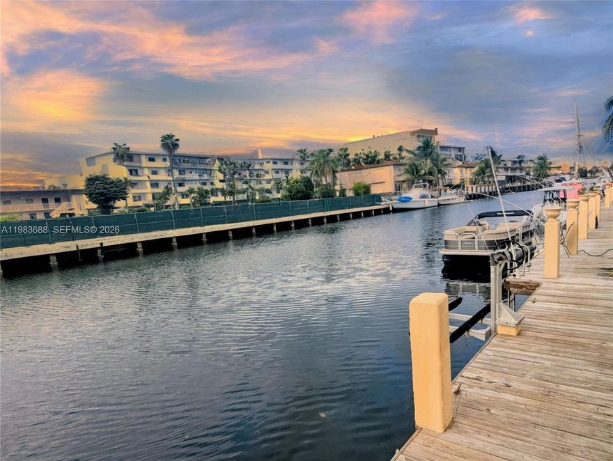 TURN-KEY WATERFRONT & DOCK IN GUARD-GATED EASTERN SHORES. This immaculate 2BR/2.5BA + Den/Office (or 3rd BR, has closet) 2-story townhome sits on a wide ocean-access canal with dock in your backyard. 100% move-in ready with a modern layout & high-end finishes. The 1st floor features polished travertine marble and an open kitchen with a butcher block island and real wood cabinetry. Upstairs, enjoy wood LVP flooring and two luxurious suites with HUGE walk-in rain showers, floating vanities, and Delta Vero fixtures. The Master suite boasts a 20ft waterfront balcony and a massive walk-in closet with built-in organizers.

OUTDOOR OASIS: Private wood deck, bar counter at dock's edge, and a weatherproof TV enclosure. 20ft dock offers unlimited ocean access with no fixed bridges and 15 min boat ride to the sandbar or Haulover Inlet.

ALL SYSTEMS UP TO DATE: Hurricane impact windows/doors, 100% LED lighting, modernized infrastructure incl electrical, AC ducts, plumbing (including underground), new roof in 2025 and seawall reinforcement in progress.  ALL assessments are PAID IN FULL. 

HOA covers building insurance, pool, game room, & landscaping. No HOA approval required. Eastern Shores features a 24/7 manned guard gate PLUS a NMB Police officer exclusively patrolling this neighborhood 24/7.  Short 10 minute walk to Intracoastal Mall dining/shops and the beach is just over the bridge. Needs nothing. Move in tomorrow for the ultimate worry-free South Florida waterfront lifestyle!