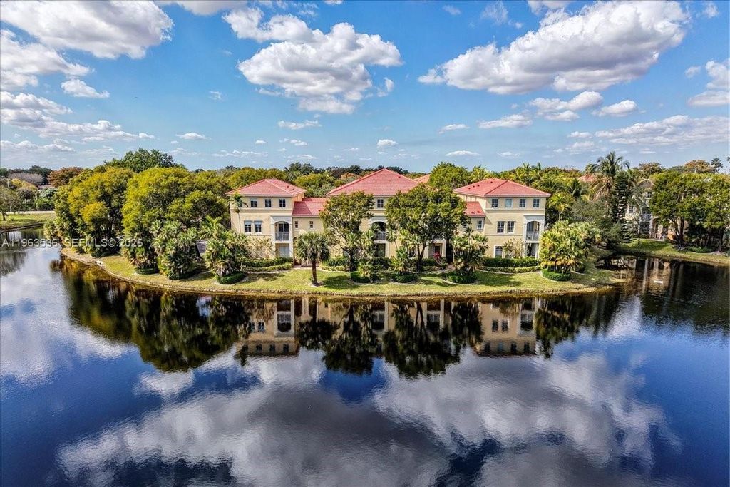 Photo of 150 Jacaranda Country Club Dr #200, Plantation, FL 33324 (MLS # A11963536)