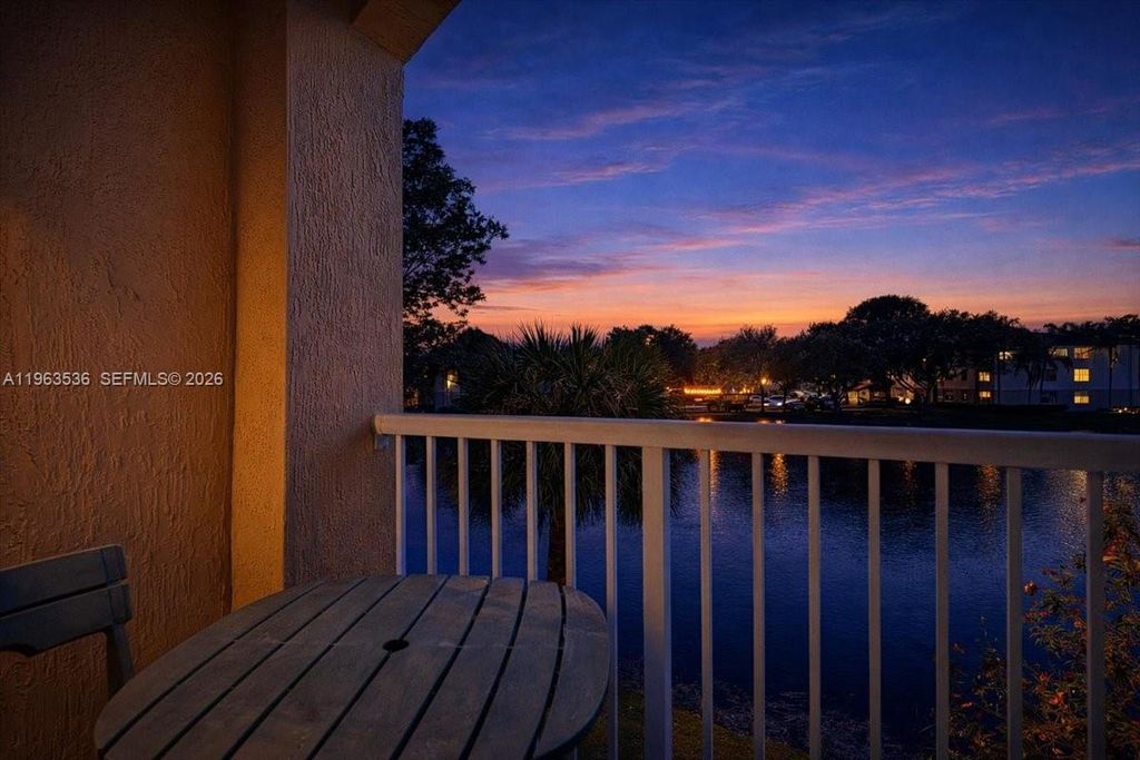 Photo of 150 Jacaranda Country Club Dr #200, Plantation, FL 33324 (MLS # A11963536)