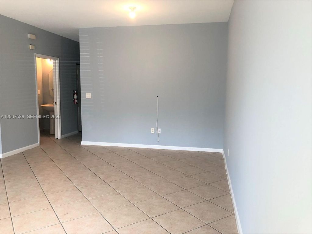 Photo of 8209 SW 25th Ct #103, Miramar, FL 33025 (MLS # A12007538)