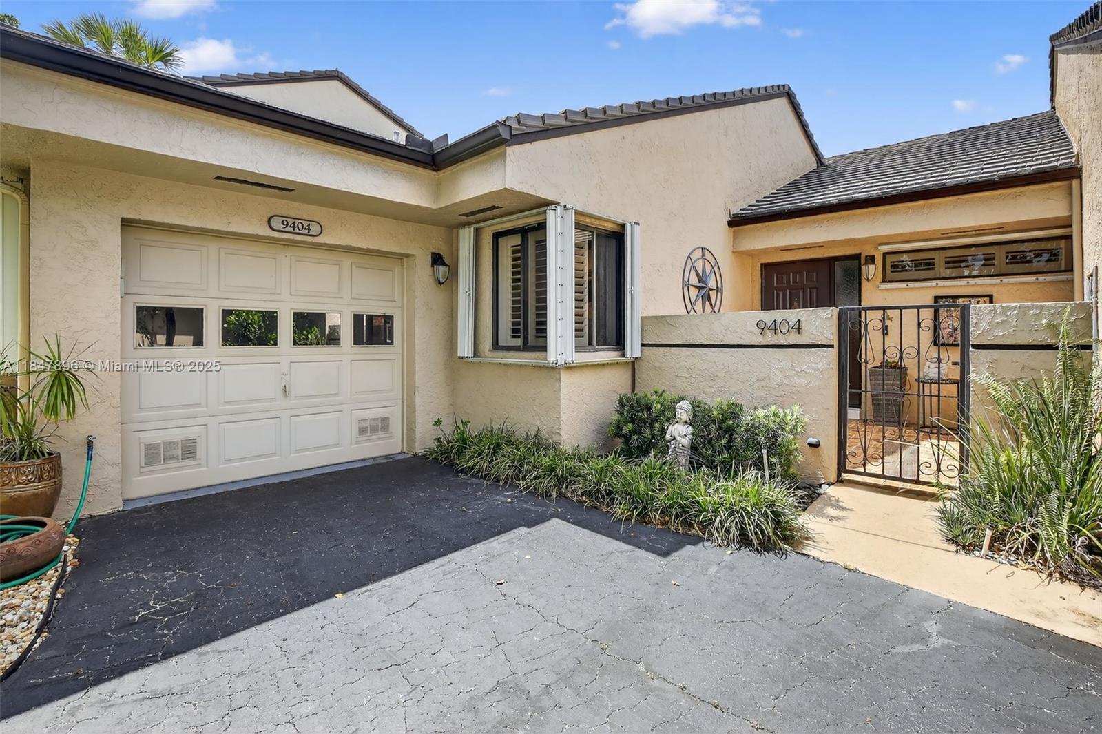 Welcome to one of the most desirable neighborhoods in Plantation—Chelsea! This beautifully updated 2-bedroom, 2-bath Ashley model is a true gem, offering single-story living with a 1-car garage and one of the largest driveways in the community (fits 3+ cars!). Inside, enjoy an opened-up kitchen that enhances flow, with tasteful finishes throughout, LED lighting (inside and out!), and upgraded plumbing (no poly pipes!). Roof replaced in 2018, new water heater, and a screened patio that opens to one of the few fenced yards in the neighborhood—perfect for privacy or pups. Ideal location with guest parking directly out front. The vibe here is everything—inside and out!