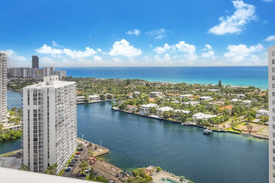 Just reduced to an incredible price! Amazing direct intracoastal & ocean water views from this spacious 2/2 immaculate condo in the heart of Aventura. Luxury living at it's best in the gated Hamptons West! Designed by Robert S Wennett and Mario Cader Frech Foundation is a blend of luxury and comfort. Elegant upgrades throughout, in-unit full size washer/dryer, could easily create a third bedroom from the den area if so desired. Amenities include garage parking & valet, two pools, cafe, market, movie theater, fitness center with sauna, spa, nail salon, party rooms, kids playroom, library, tennis and racquet ball courts, stunning clubhouse restaurants overlook the intracoastal. Short distance to Aventura mall, golf courses, parks & restaurants. Motivated Seller will pay all assessments at closing!