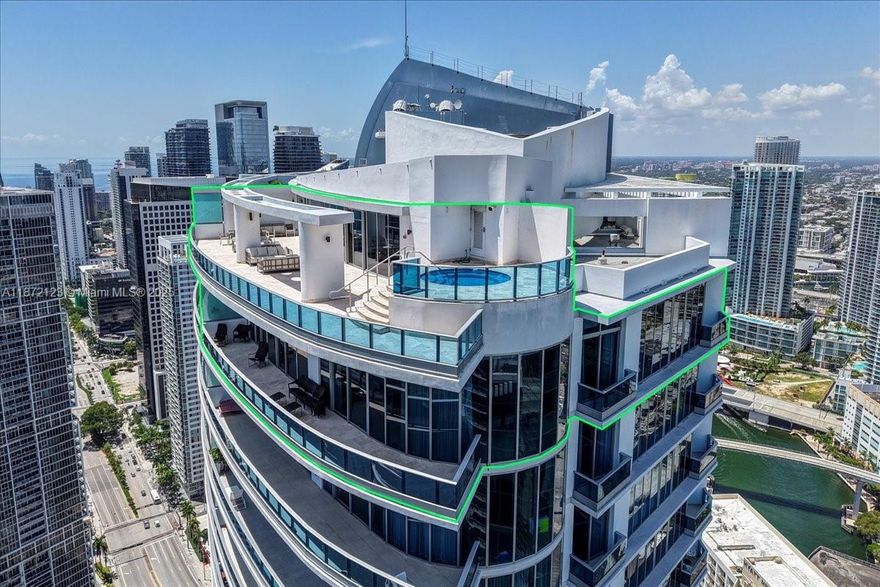 A House In The Sky! This extraordinary 2-Story Penthouse spans over 4300 living sq ft with east facing panoramic views of Biscayne Bay, Ocean, & Miami's Skyline. Ideal for indoor & outdoor living with 5 balconies including a rooftop terrace with your very own heated plunge pool. Features include a floating illuminated staircase, open chef’s kitchen with high-end Miele appliances, custom closets/doors, Tesla Charger secure to your parking space & 2 oversized storage units. Primary suite w/spa-like marble bath, soaking tub, & oversized shower. The 2nd floor is your ultimate entertainment center that can be converted into a 4th bedroom or in-law suite  Epic Residences is conveniently located within walking distance from Brickell, Bayfront, & One World Center. This is truly a House in the Sky!