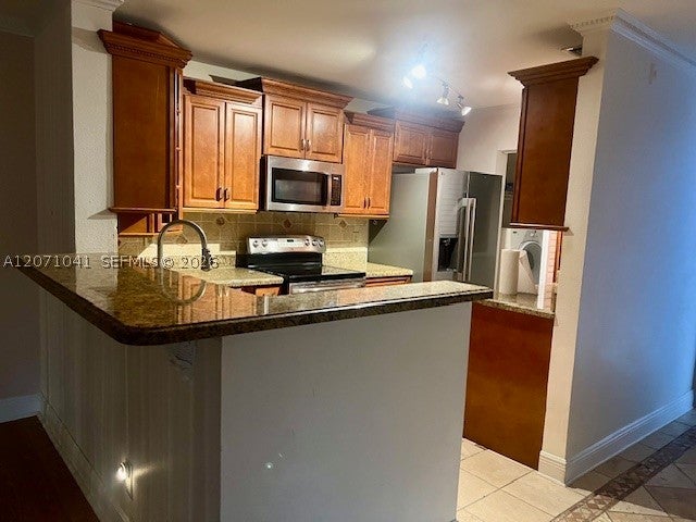 Photo of 11229 W Atlantic Blvd #108, Coral Springs, FL 33071 (MLS # A12071041)