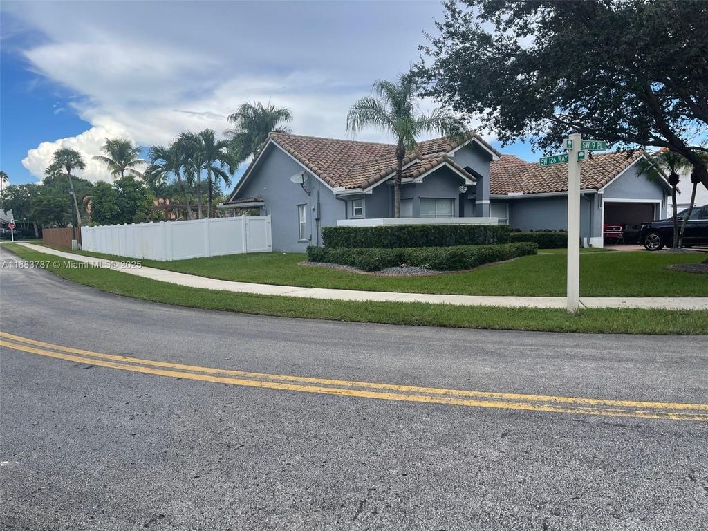 Photo of 12645 SW 9th Pl, Davie, FL 33325 (MLS # A11883787)