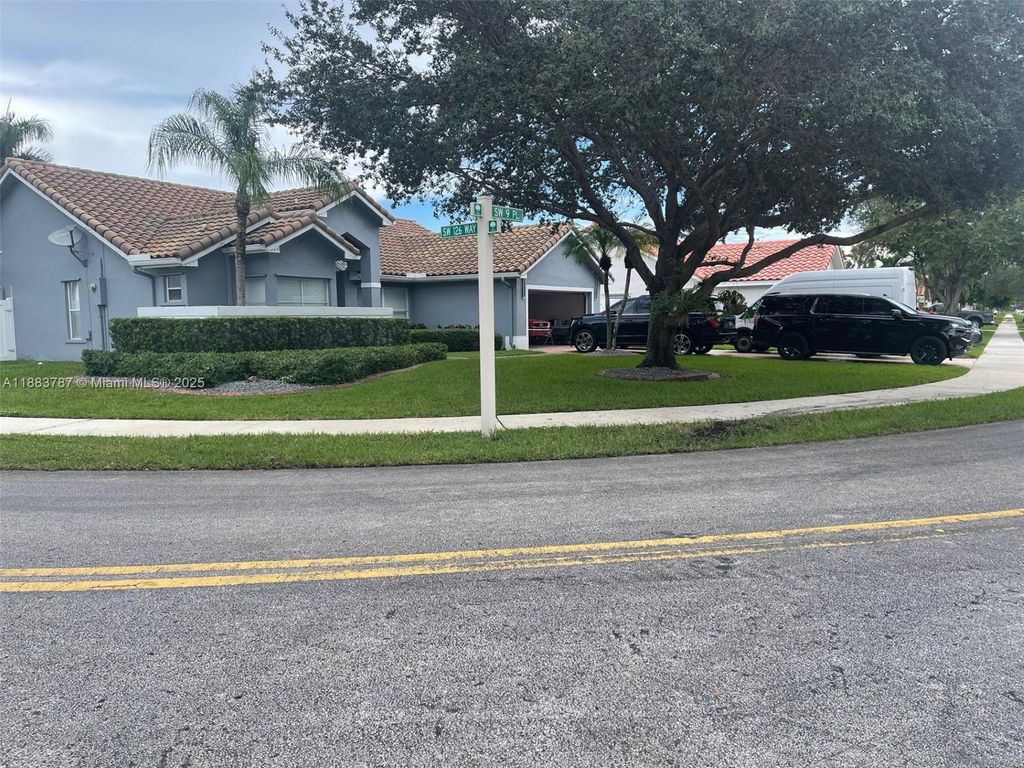 Photo of 12645 SW 9th Pl, Davie, FL 33325 (MLS # A11883787)