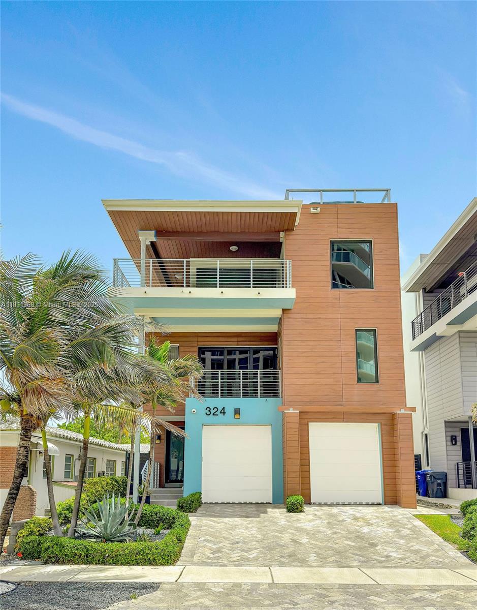 This stunning modern home with 4 bedrooms and 3/1 bathrooms spans three floors and private roof top terrace, offering breathtaking ocean views at just 50 yards from the water. Sleek architectural design and expansive glass walls, the house is filled with natural light. The main floor features open concept living and dining area with floor to ceiling windows that connects the indoor with the coastal surroundings. A contemporary kitchen with high end appliances and minimalist finishes make it perfect for entertaining. The roof top terrace is design for relaxation with a hot tub and outdoor shower with tankless water heater.
The house has extensive improvements like elevator, custom build furniture to maximize space and versatility, extra outdoor storage for beach chairs and grill equipment.