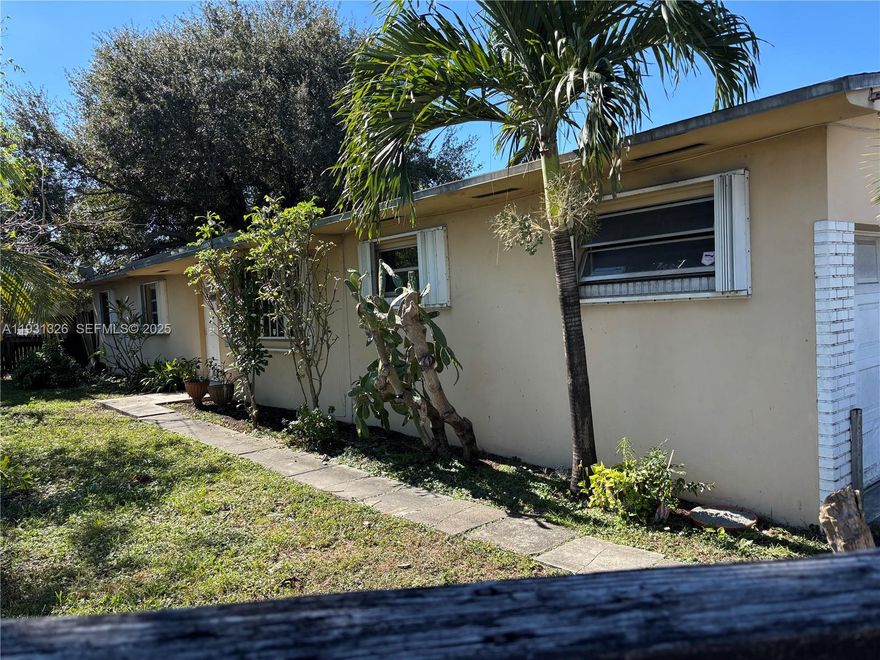 LOTS OF ROOM & POTENTIAL! Spacious 3-bedroom, 2-bath home featuring a garage, family room, den, and Florida room — offering approximately 2,064 sq. ft. of living space. Situated on a corner lot within walking distance to houses of worship and conveniently close to shopping, Aventura, and major highways for easy access to Ft. Lauderdale and Downtown Miami. This home offers generously sized bedrooms and bathrooms, central A/C (approximately 2 years old), plus two additional mini-split units for added comfort. Enjoy a large front yard and a spacious backyard with room for a pool — perfect for entertaining or future expansion. Property needs some TLC; price reflects condition and consideration for a new roof. Sold AS-IS. Endless possibilities to make this home your own!