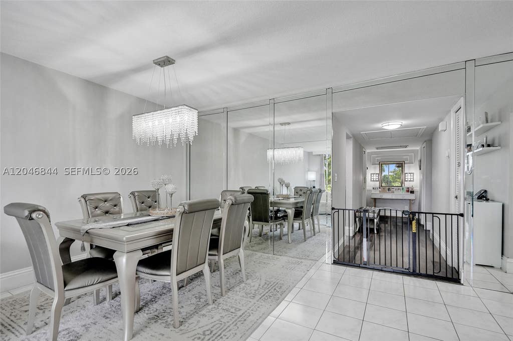 Photo of 2651 S Course Dr #410, Pompano Beach, FL 33069 (MLS # A12046844)