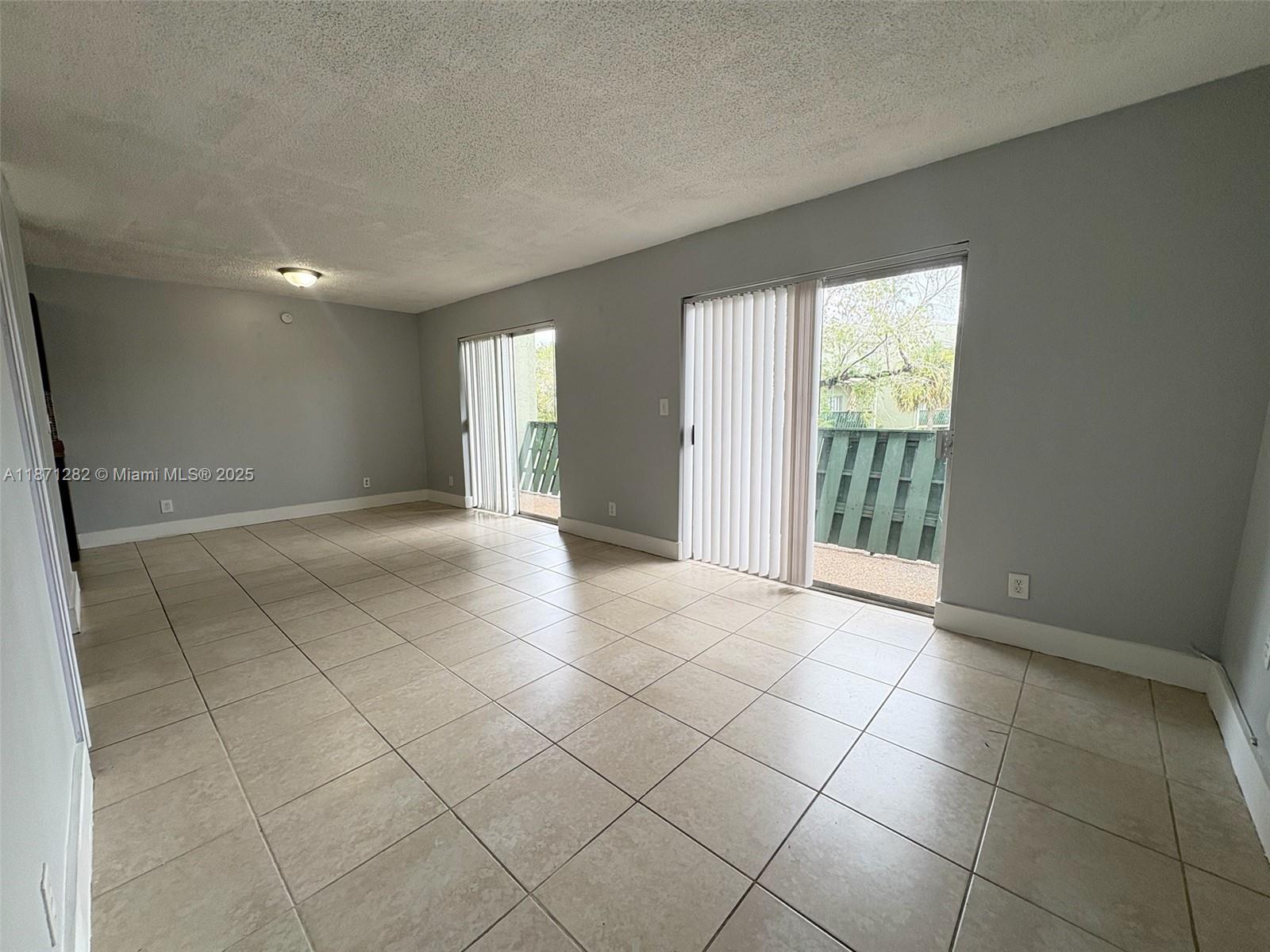 Move-in ready 2-bedroom / 2-bathroom townhouse in an excellent community. Features tile and laminate floors throughout, a wood-cabinet kitchen with a complete set of appliances, an in-unit washer & dryer, and central A/C. Centrally located close to great dining options and public transportation. If a pet is approved, a non-refundable deposit of $300 will be required. Dogs can weigh up to 20 pounds; landlords typically don’t accept dogs weighing more than that. Before moving in, the landlord requires mandatory renter's insurance, a one-month rent payment, and two security deposits.