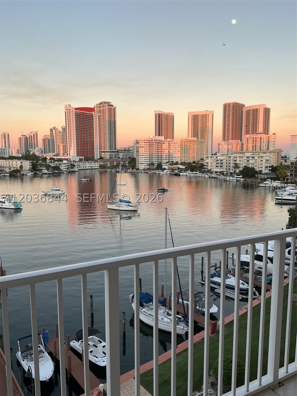 Photo of 400 Golden Isles Dr #55, Hallandale Beach, FL 33009 (MLS # A12036844)