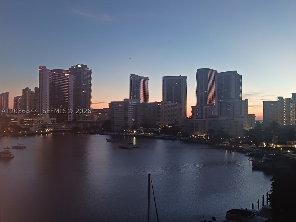 Photo of 400 Golden Isles Dr #55, Hallandale Beach, FL 33009 (MLS # A12036844)
