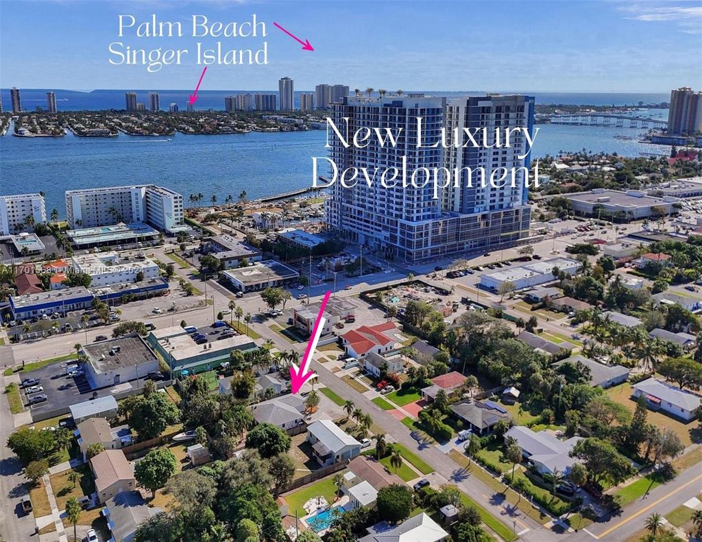 Photo of 131 Date Palm Dr, Lake Park, FL 33403 (MLS # A11701568)