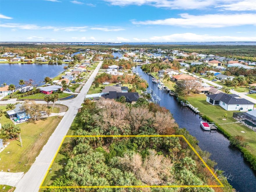 Calling all boaters and fishermen! Are you looking for the perfect property to build your dream home? Look no further! Deep water SAILBOAT access/ large power boat access, NO fixed bridges and only a short distance to Charlotte Harbor. This property is located in a quiet neighborhood. Only 13 miles from Punta Gorda Airport and a short distance to restaurants, dinning, shopping, fishing piers, boat ramps, Fisherman's village, downtown, medical centers, Port Charlotte Beach Park and so much more! WATCH THE VIRTUAL TOUR!!!