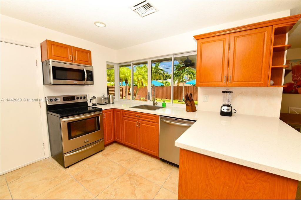 Photo of 2001 NE 62nd St, Fort Lauderdale, FL 33308 (MLS # A11442069)