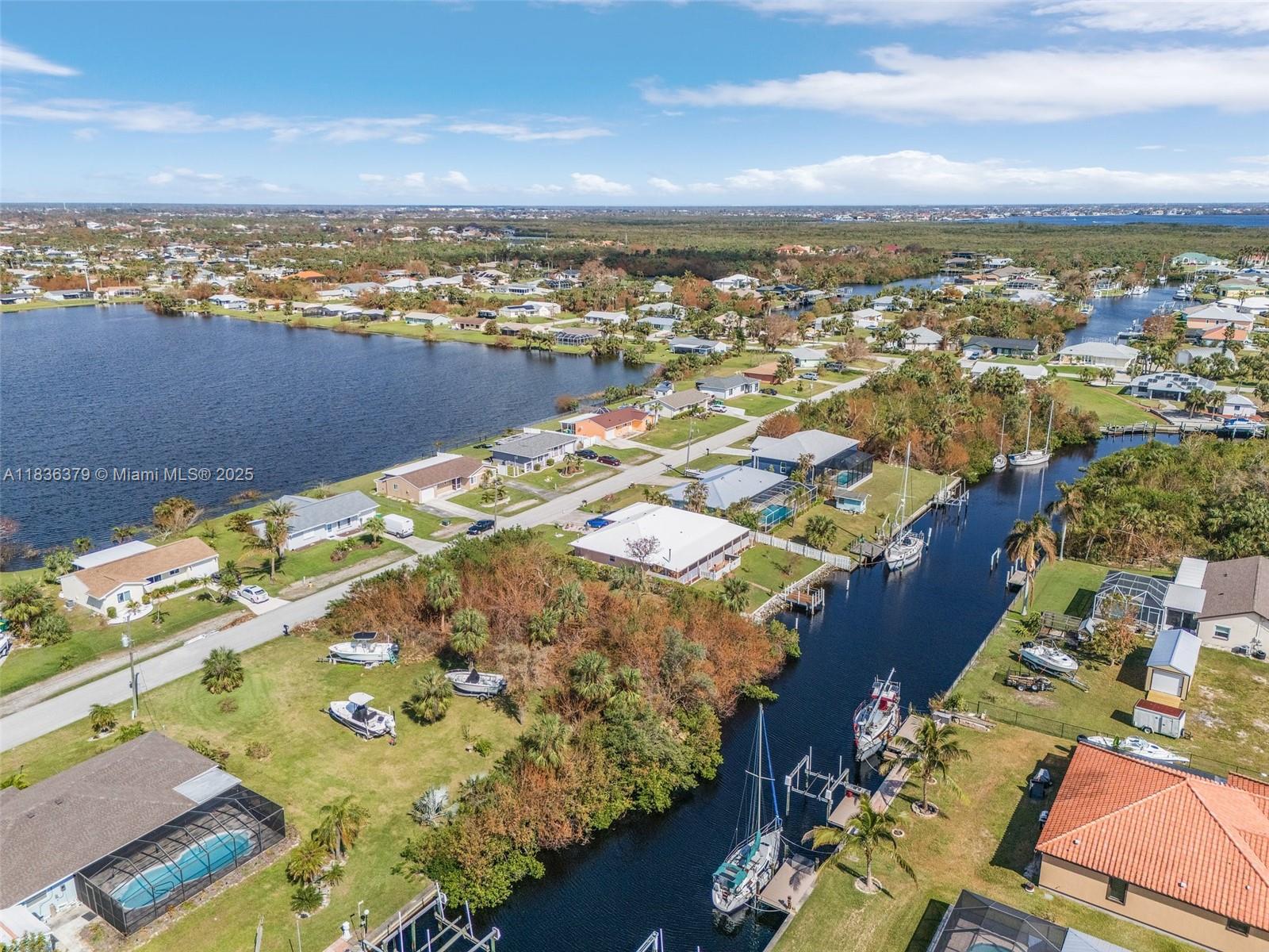Calling all boaters and fishermen! Are you looking for the perfect property to build your dream home? Look no further! Deep water SAILBOAT access/ large power boat access, NO fixed bridges and only a short distance to Charlotte Harbor. This property is located in a quiet neighborhood. Only 13 miles from Punta Gorda Airport and a short distance to restaurants, dinning, shopping, fishing piers, boat ramps, Fisherman's village, downtown, medical centers, Port Charlotte Beach Park and so much more! WATCH THE VIRTUAL TOUR!!!