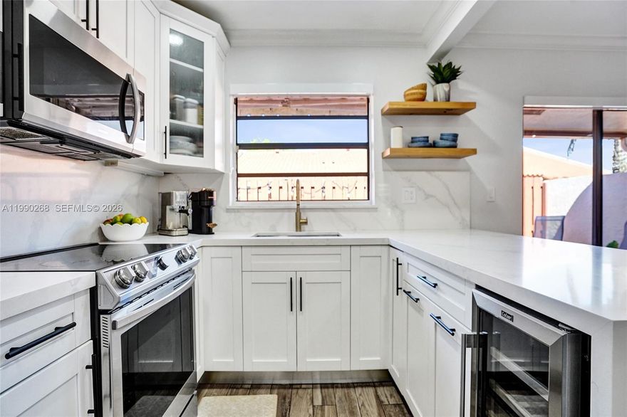 GORGEOUS VILLA W/2 BD, 2 BATHS, & DEN (EASY 3RD BDRM W/CLOSET & WINDOW).  PERFECT FOREVER HOME OR STARTER HOME.  RECENTLY REMODELED W/NEW KITCHEN CABINETS & QUARTZ COUNTERTOPS, STAINLESS STEEL DOUBLE DOOR REFRIGERATOR, SLIDE IN RANGE & WINE COOLER, NEW TILE FLOORING,  OVERSIZE MASTER BDRM W/WALL TO WALL CLOSET AND NEWLY REMODELED MASTER BATH, MODERN ENTRY ROOM & CLOSET DOORS THROUGOUT THE HOME, UPDATED BASEBOARDS, NEWER CENTRAL A/C, TILE ROOF (2018), FULL SIZE WASHER & DRYER W/CABINET STORAGE, ACCORDIAN SHUTTERS, FENCED IN CONCRETE PATIO AREA W/CANOPY AWNING. TWO ASSIGNED PKG IN FRONT OF UNIT, LOCATED IN THE SOUGHT AFTER COMMUNITY OF FOREST LAKE. A+ SCHOOLS, LOW HOA DUES, PARK JUST MINUTES AWAY & MUCH MORE. MAKE IT MUST SEE!!  EASY TO SHOW!