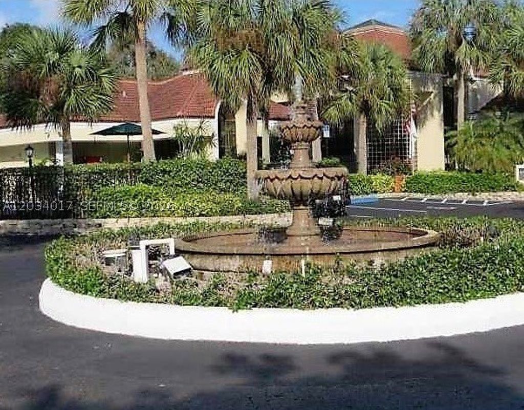 Photo of 1715 Village Blvd #107, West Palm Beach, FL 33409 (MLS # A12034017)