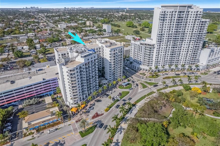 Experience elevated urban living in this upgraded residence at Radius Condominium in the heart of Downtown Hollywood. This unit features wood and tile flooring throughout, a modern kitchen with granite countertops and stainless steel appliances, in-unit washer and dryer, and a tankless water heater. Enjoy tall ceilings, a spacious bathroom with hot tub and separate shower, and beautiful views overlooking ArtsPark with partial ocean views. Radius offers resort-style amenities including a rooftop pool, fitness center, spa/sauna, theater room, business center, 24-hour security, and valet. Prime location within walking distance to shops, restaurants, supermarkets, and just minutes to Hollywood Beach and Boardwalk.