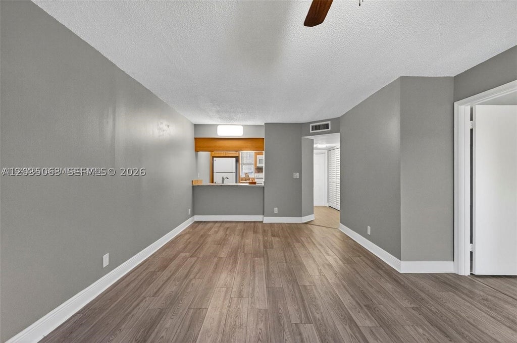 Photo of 908 Twin Lakes Dr #8-C, Coral Springs, FL 33071 (MLS # A12035063)