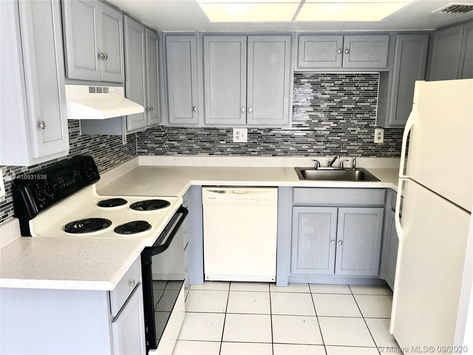 Great investment or live in opportunity! This 2 Bedroom Corner unit with private fenced front yard and private single car garage has been fully updated with new kitchen cabinets, New Internal A/C components together with compressor, New bathrooms & fresh paint throughout. The Unit is MOVE IN OR RENT READY!! OK TO LEASE right away!