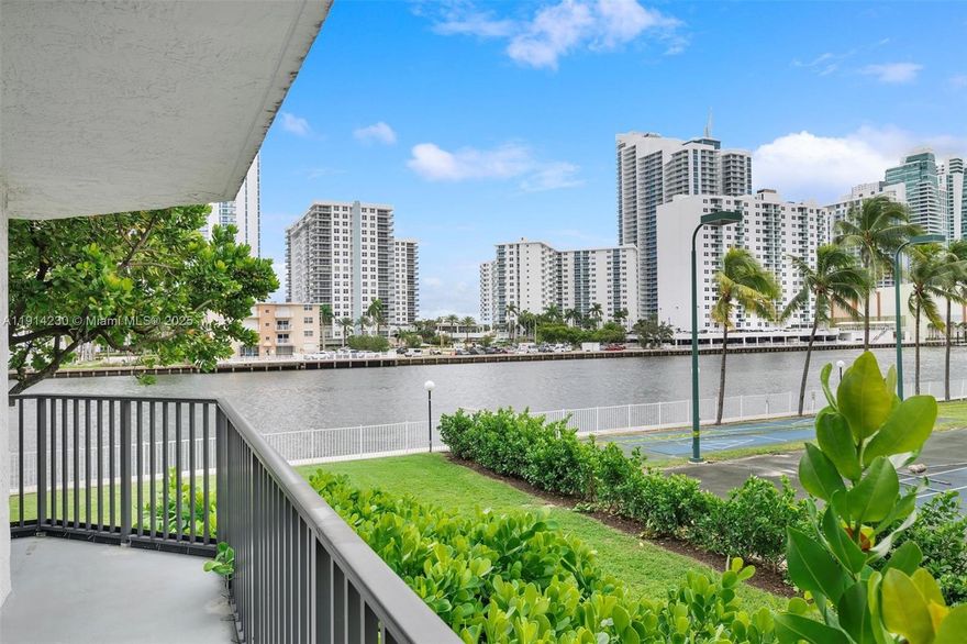 This corner residence offers exceptional privacy and the rare advantage of stunning, close-up Intracoastal views from every angle—making its setting truly special. Featuring 2 beds, 2 baths, and a versatile den that can easily be converted into a 3rd bed or office, the home provides generous space and flexibility to fit your lifestyle. Enjoy an upgraded kitchen and baths, floor-to-ceiling windows, hardwood floors, and a wraparound balcony perfect for immersing yourself in the serene waterfront scenery. Resort-style amenities include a heated pool, tennis courts, a fitness center, and 24-hour security. Ideally located just minutes drive from the beach, Hollywood Boardwalk, FLL Airport, dining, shopping, and casinos, this residence combines comfort, convenience, and captivating water views.