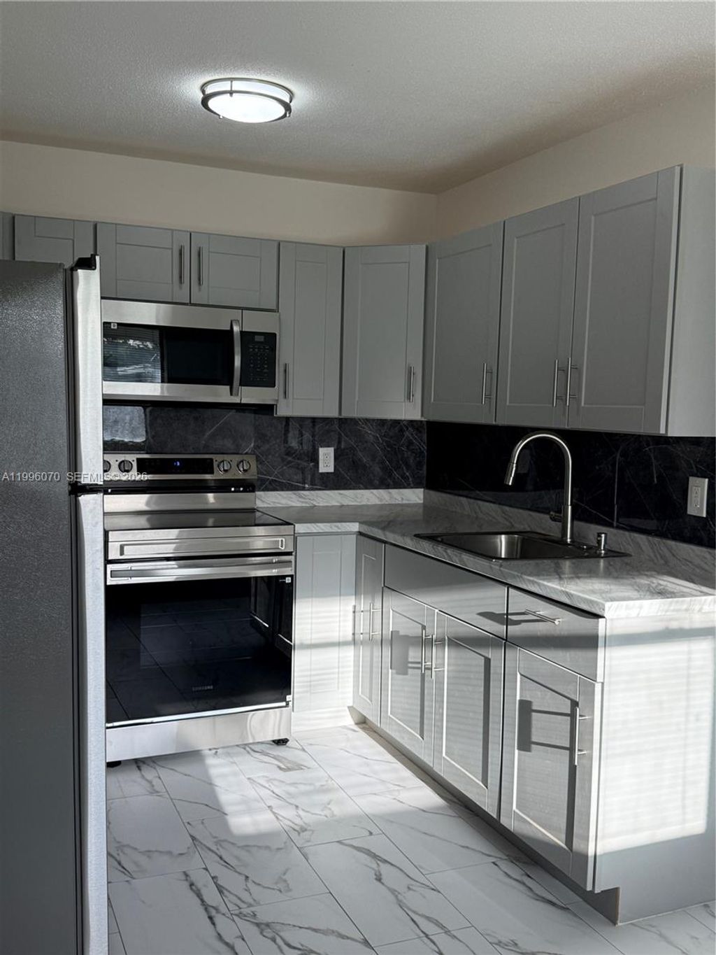 Photo of 6071 SW 33rd St #4, Miramar, FL 33023 (MLS # A11996070)