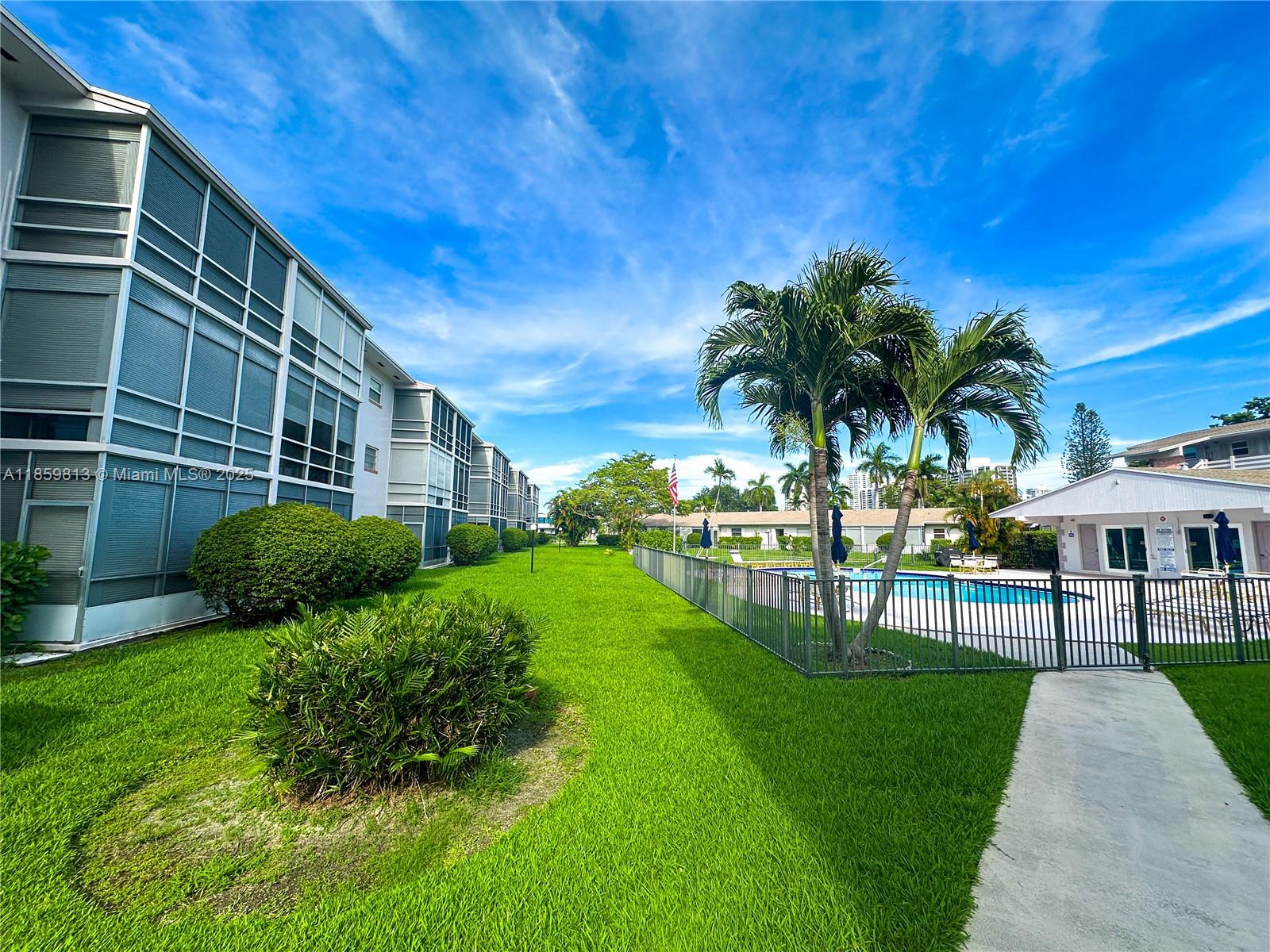 Nestled within the secure and highly desirable Golden Isles gated community, this one-bedroom, one-bathroom condominium is just minutes from the beach. The unit features a hurricane-impact slider that opens to a private screened-in porch with tranquil garden and pool views. This inviting outdoor space overlooks lush green surroundings, perfect for relaxing or entertaining.
Residents enjoy a variety of community amenities including a BBQ and picnic area, clubhouse, community room, swimming pool, shuffleboard, vehicle wash area, trash chute, and elevator access.
Ideally located, the property is only minutes from shopping, dining, and groceries, and less than one mile from Gulfstream Park Racing & Casino.