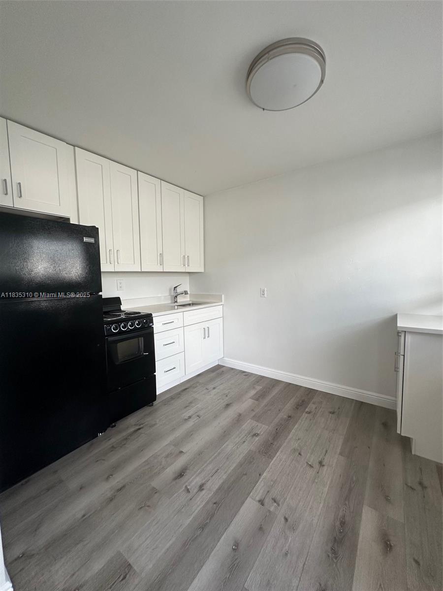 Excellent imove ready opportunity! Just 5 minutes from the beach and walking distance to Gulfstream Park, this fully renovated 1 bed / 1 bath unit is part of a two-unit property. Only 8 minutes from Aventura Mall, with quick access to shopping, dining, and entertainment. The property features an oversized fenced backyard with privacy hedges, new hurricane-impact windows, new A/C, remodeled kitchen, bathrooms, and floors, as well as new window treatments. Additional highlights include a shared laundry room on-site, newer roof, and assigned parking. Move-in ready!