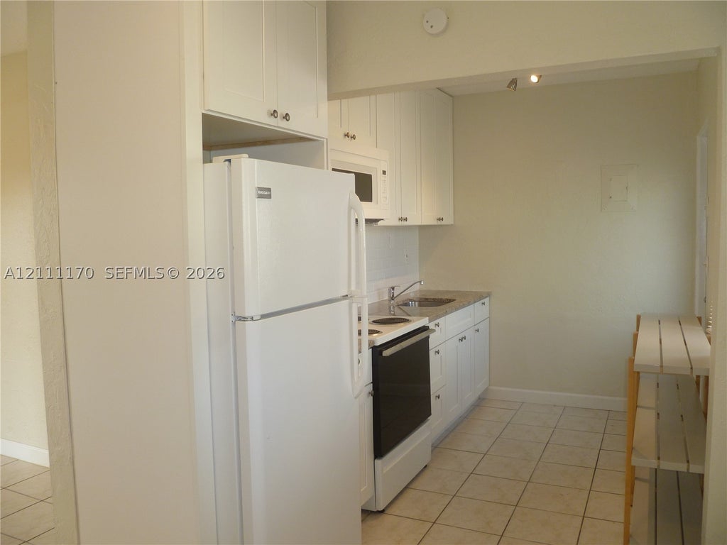 Photo of 1005 N 18th Ct #5, Hollywood, FL 33020 (MLS # A12111170)